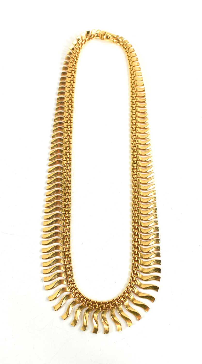 Lot 32 - An 18ct gold necklace, composed of graduated...
