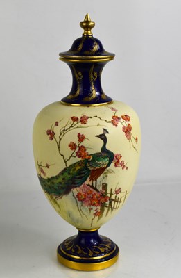 Lot 167 - A Royal Worcester vase and cover painted with...