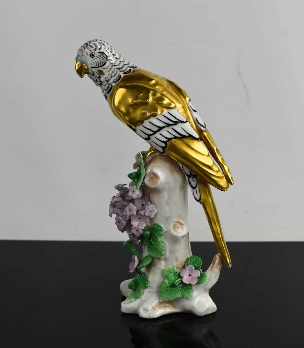 Lot 220 - A 19th century Samson of Paris parrot perched...