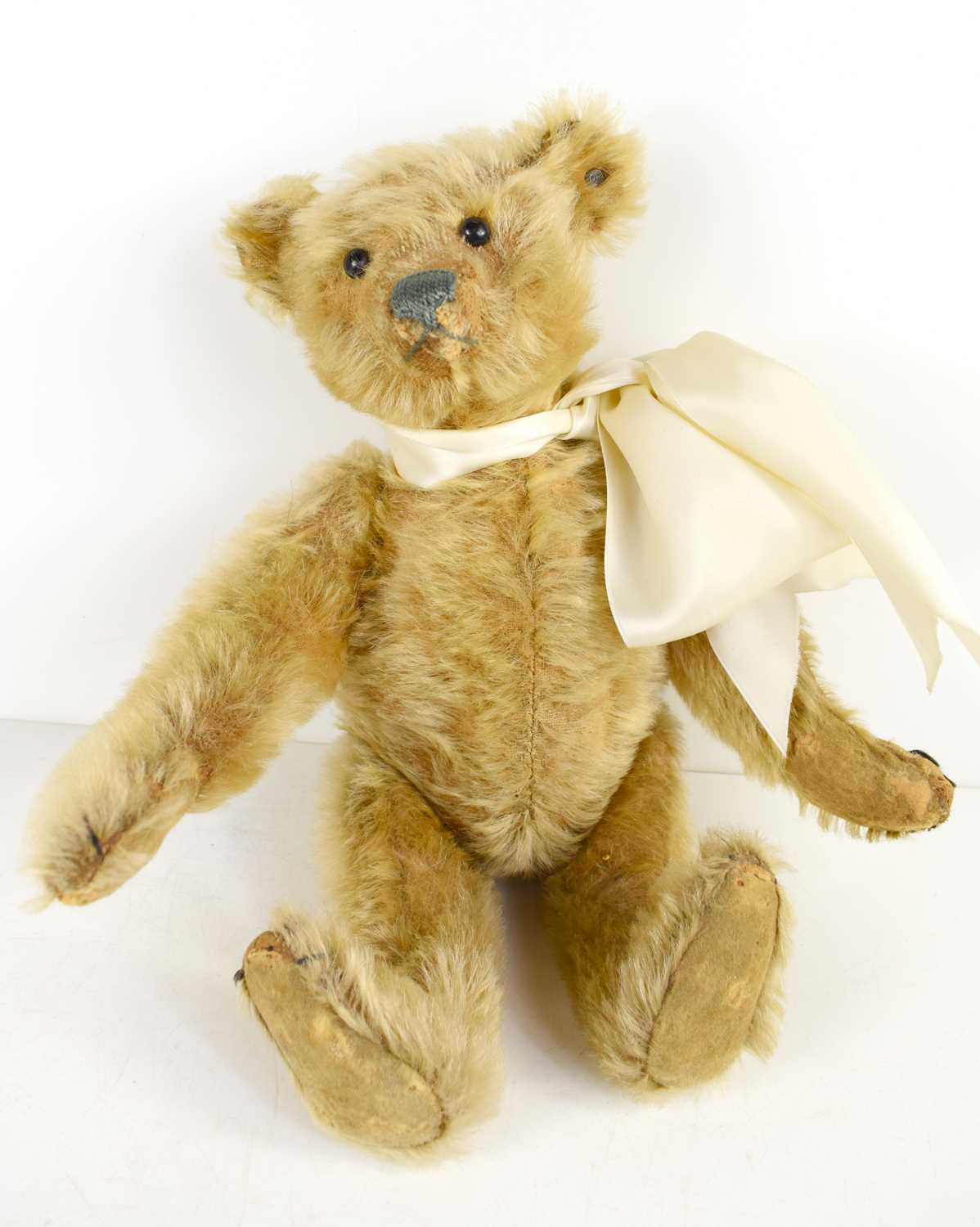 Lot 110 - A vintage Steiff teddy bear, bearing original...