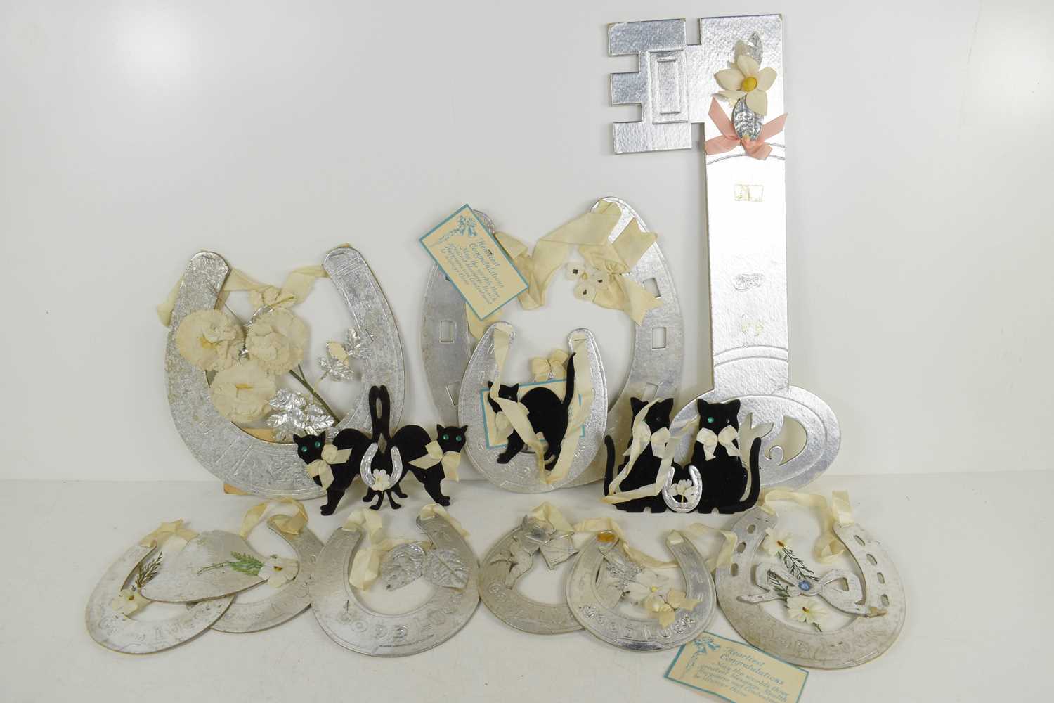 Lot 385 - A group of vintage silvered display gifts to...