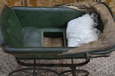 Lot 96 - A Victorian doll's pram c. 1890 with green...