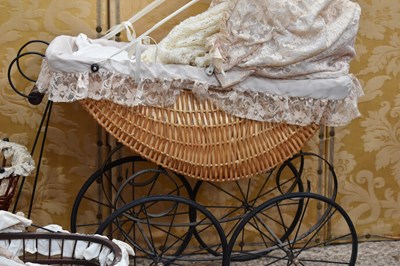 Lot 52 - Four 20th century Victorian-style dolls prams...