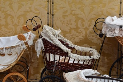 Lot 52 - Four 20th century Victorian-style dolls prams...