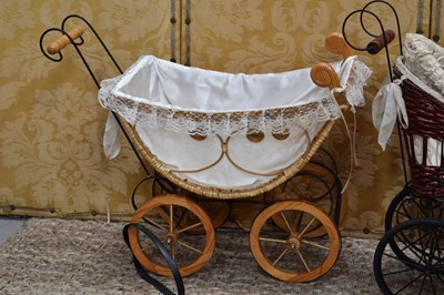 Lot 52 - Four 20th century Victorian-style dolls prams...