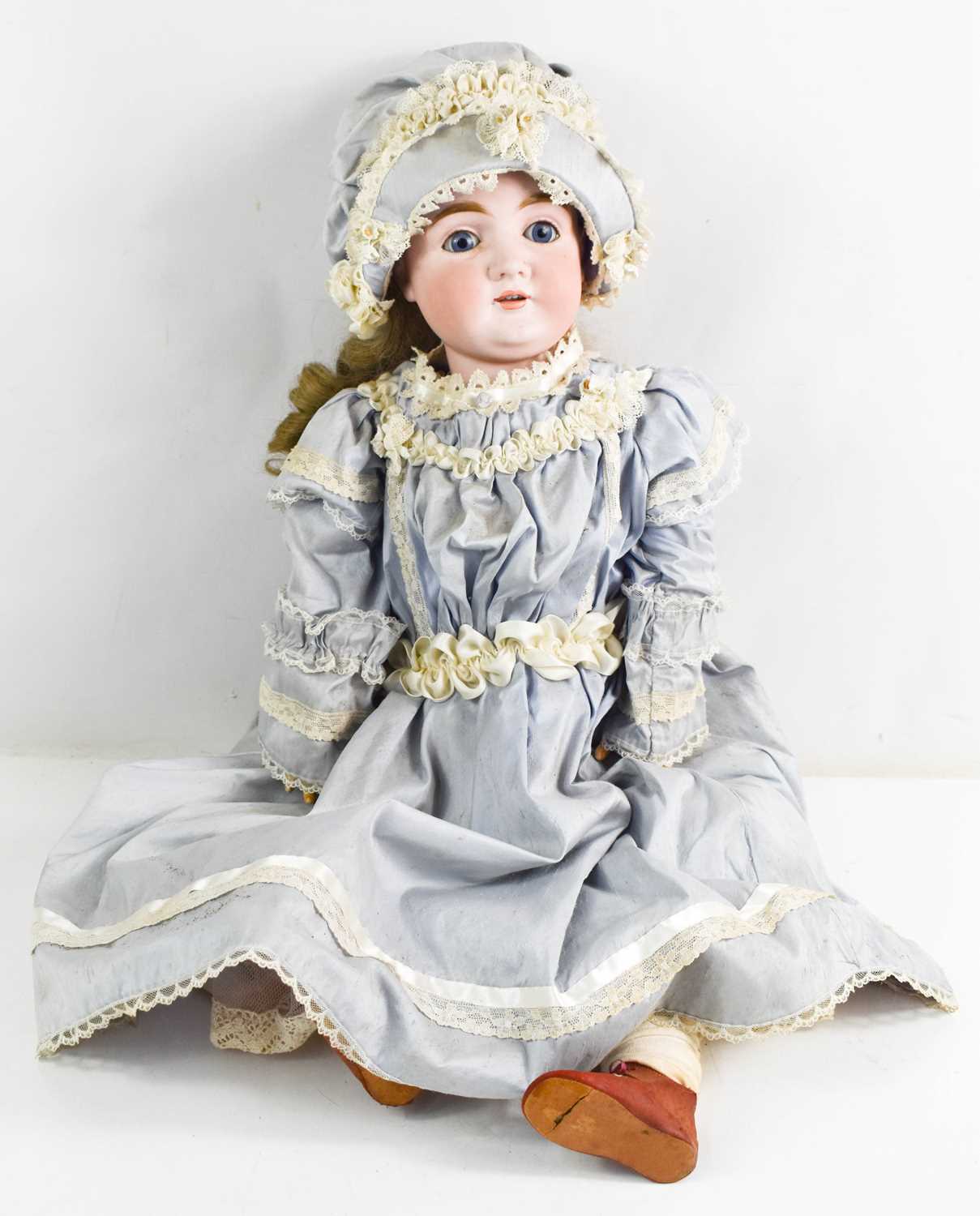 Lot 33 - A German porcelain bisque head doll, with blue...