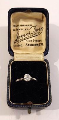 Lot 92 - An 18ct gold and diamond solitaire ring, the...