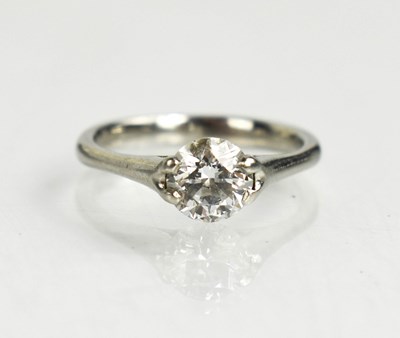 Lot 94 - A platinum and diamond solitaire ring, the...