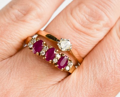 Lot 119 - A 9ct gold, pink sapphire and diamond ring...