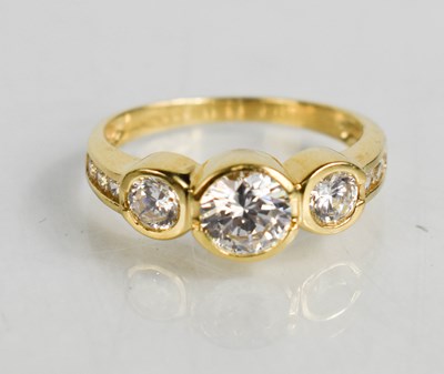 Lot 191 - A Clogau 14ct gold and cubic zirconia three...