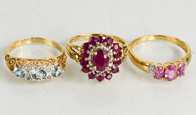 Lot 190 - A 9ct gold, pink sapphire and diamond cluster...