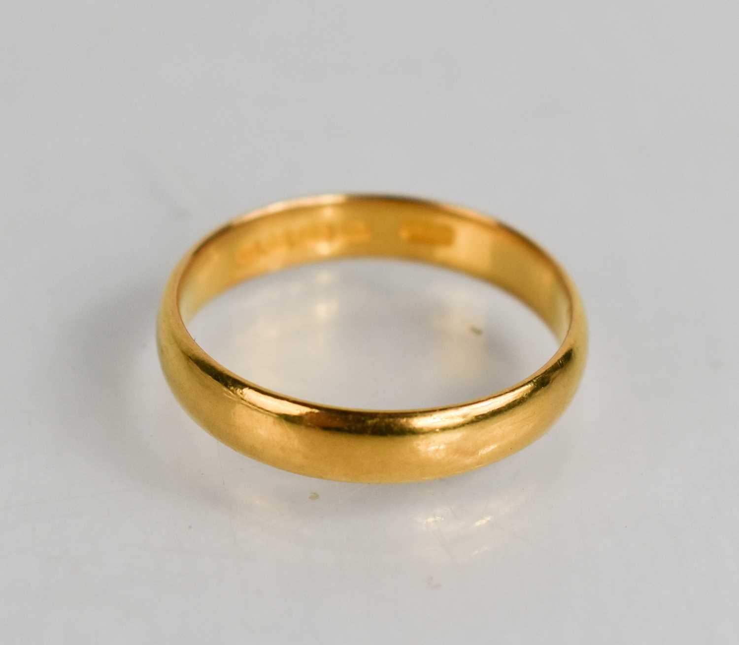 Lot 45 - A 22ct gold wedding band, size S, 4.53g.