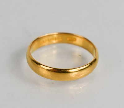 Lot 45 - A 22ct gold wedding band, size S, 4.53g.