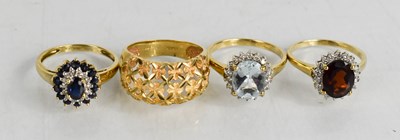 Lot 200 - Four 9ct gold rings, set with various...