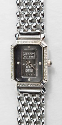 Lot 44 - A ladies wristwatch, inset with a 999.5 Credit...