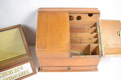 Lot 351 - A Chemist's / Apothecary oak display table...
