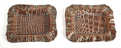 Lot 343 - A pair of Arts and crafts embossed copper...