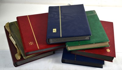 Lot 335 - A group of seven stamp albums containing USA ...