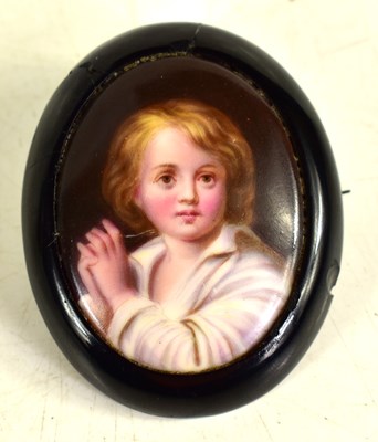 Lot 194 - A Victorian jet brooch set with a handpainted...