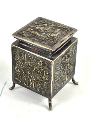Lot 257 - A Chinese export white metal box raised on...