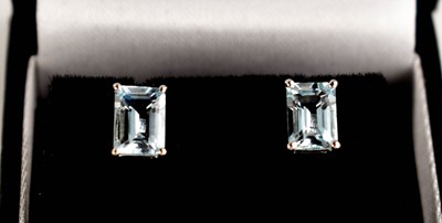 Lot 91 - A pair of 18ct white gold and emerald cut...