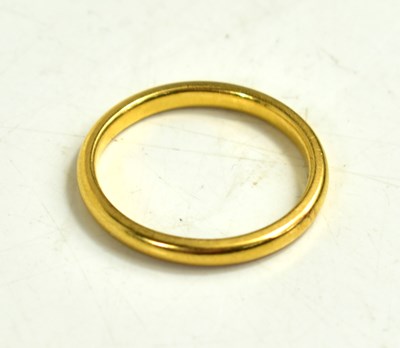 Lot 222 - A 22ct gold wedding band, 4.1g, size R/Q.