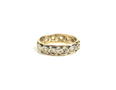 Lot 213 - A 9ct gold and silver ring, size M/L, 4.4g.
