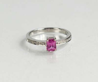 Lot 87 - An 18ct white gold, pink sapphire and diamond...