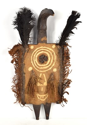 Lot 401 - An African wooden carved tribal bird mask,...
