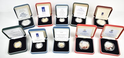 Lot 294 - A collection of cased silver coins to include...