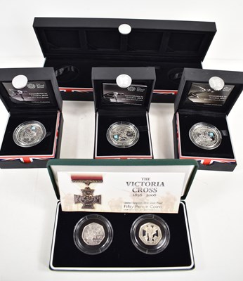 Lot 292 - A collection of silver coins to include three...
