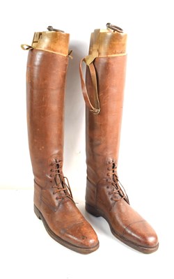 Lot 174 - A pair of Edwardian leather riding / hunting...