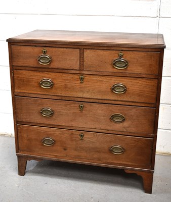 Lot 552 - A 19th century oak chest of drawers, with two...