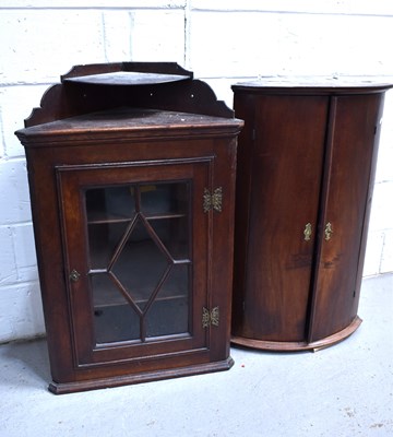 Lot 536 - Two 19th century corner cupboards, one in...