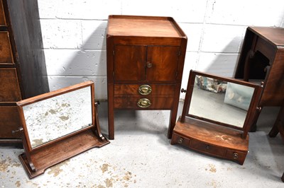 Lot 537 - A 19th century mahogany pot cupboard, with two...