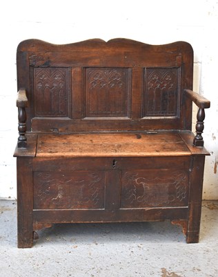 Lot 561 - A late 17th / early 18th century oak settle,...