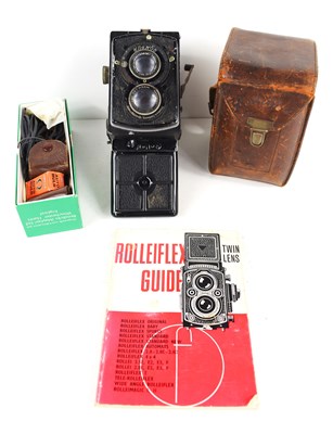 Lot 437 - A vintage Rolleiflex "Compur" camera with Carl...