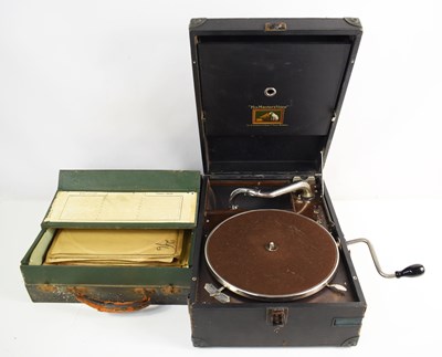 Lot 396 - A vintage portable HMV gramophone together...