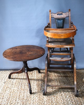 Lot 541 - A Victorian oak high chair, raised on wheels,...