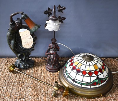 Lot 390 - An Art Nouveau style table lamp in the form of...