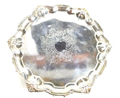Lot 265 - A silver salver in the Georgian style shell...