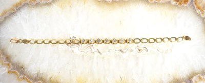 Lot 216 - A 9ct gold bracelet set with heart shaped...