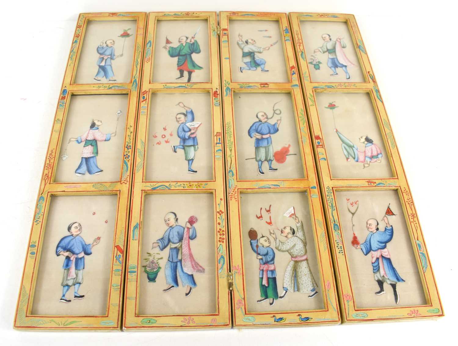 Lot 135 - A Chinese folding screen containing twelve...
