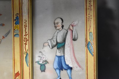 Lot 135 - A Chinese folding screen containing twelve...