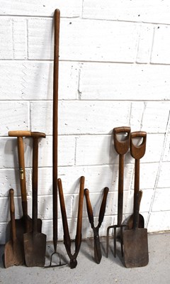 Lot 519 - A group of antique tools, with wooden handles,...