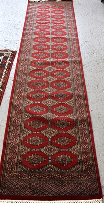 Lot 509 - An Indian tribal wool rug, with dark red...