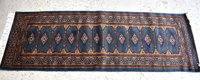 Lot 510 - An Indian tribal wool runner with grey-blue...