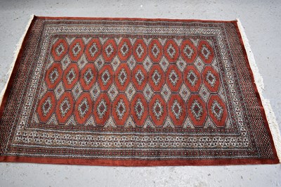 Lot 505 - An Indian tribal wool rug, with burnt umber...