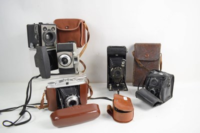 Lot 433 - A group of cameras to include an Eastman Kodak...