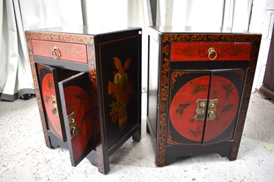 Lot 532 - A pair of modern Chinese cabinets, black and...